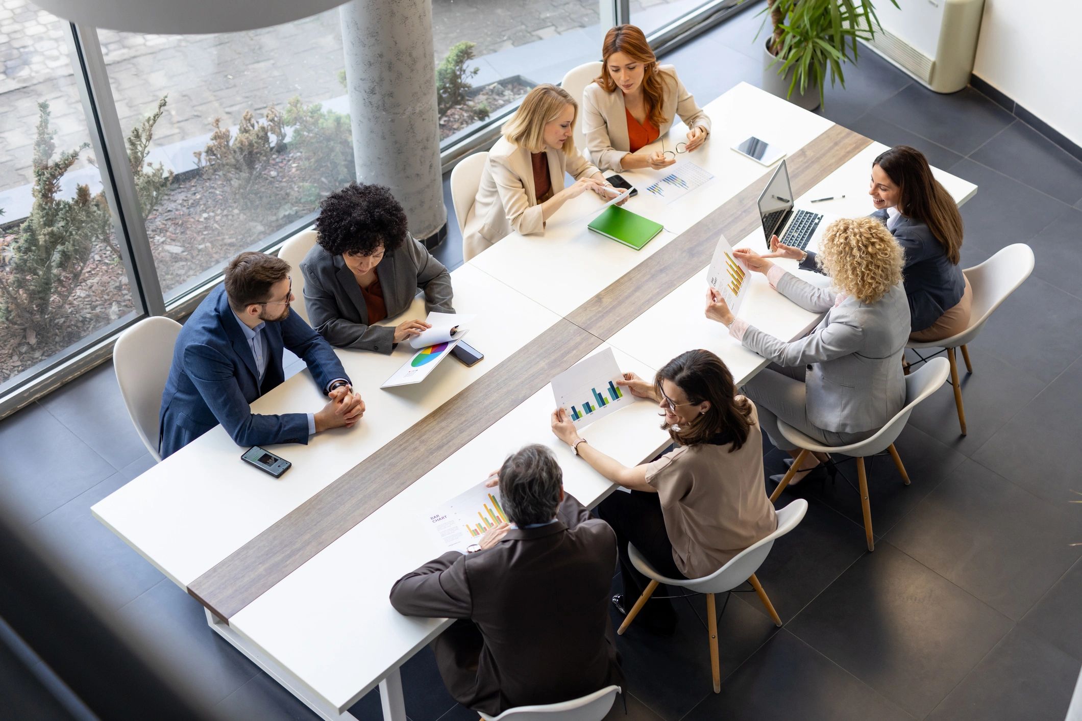 Business team reviewing financial plans in a meeting